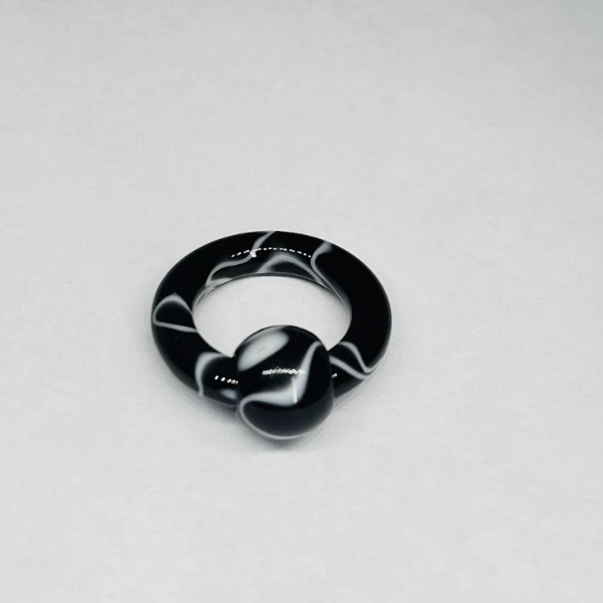 6G Black with White Faux Marble Acrylic Captive Bead Ring