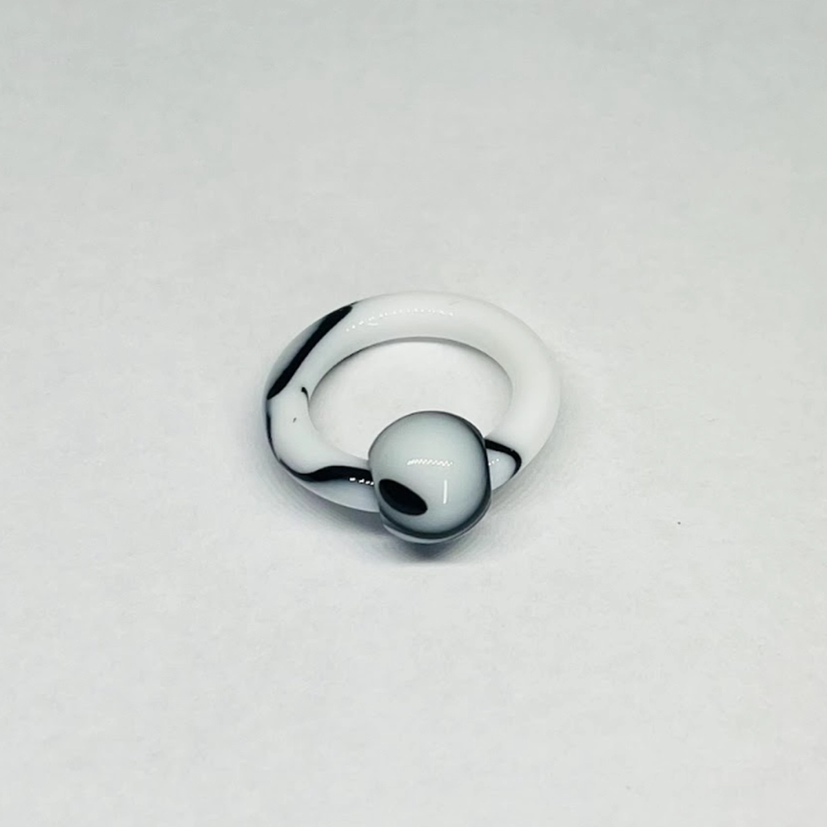 8G White with Black Faux Marble Captive Bead Ring